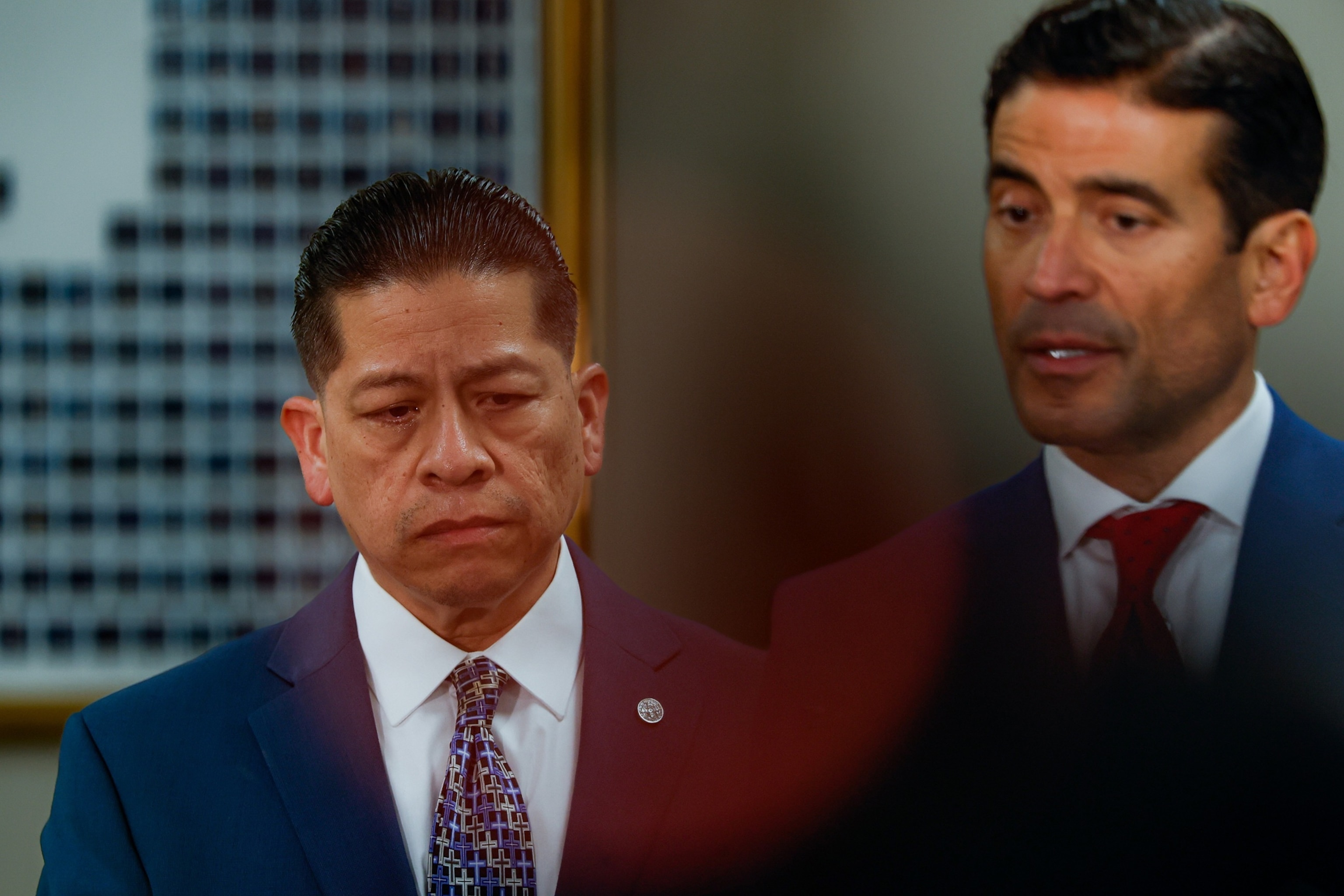 PHOTO: Former Uvalde school district police officer Adrian Gonzales, left, reacts to answer reporters' questions after the jury found Gonzales not guilty at the Nueces County Courthouse, Jan. 21, 2026, in Corpus Christi, Texas.