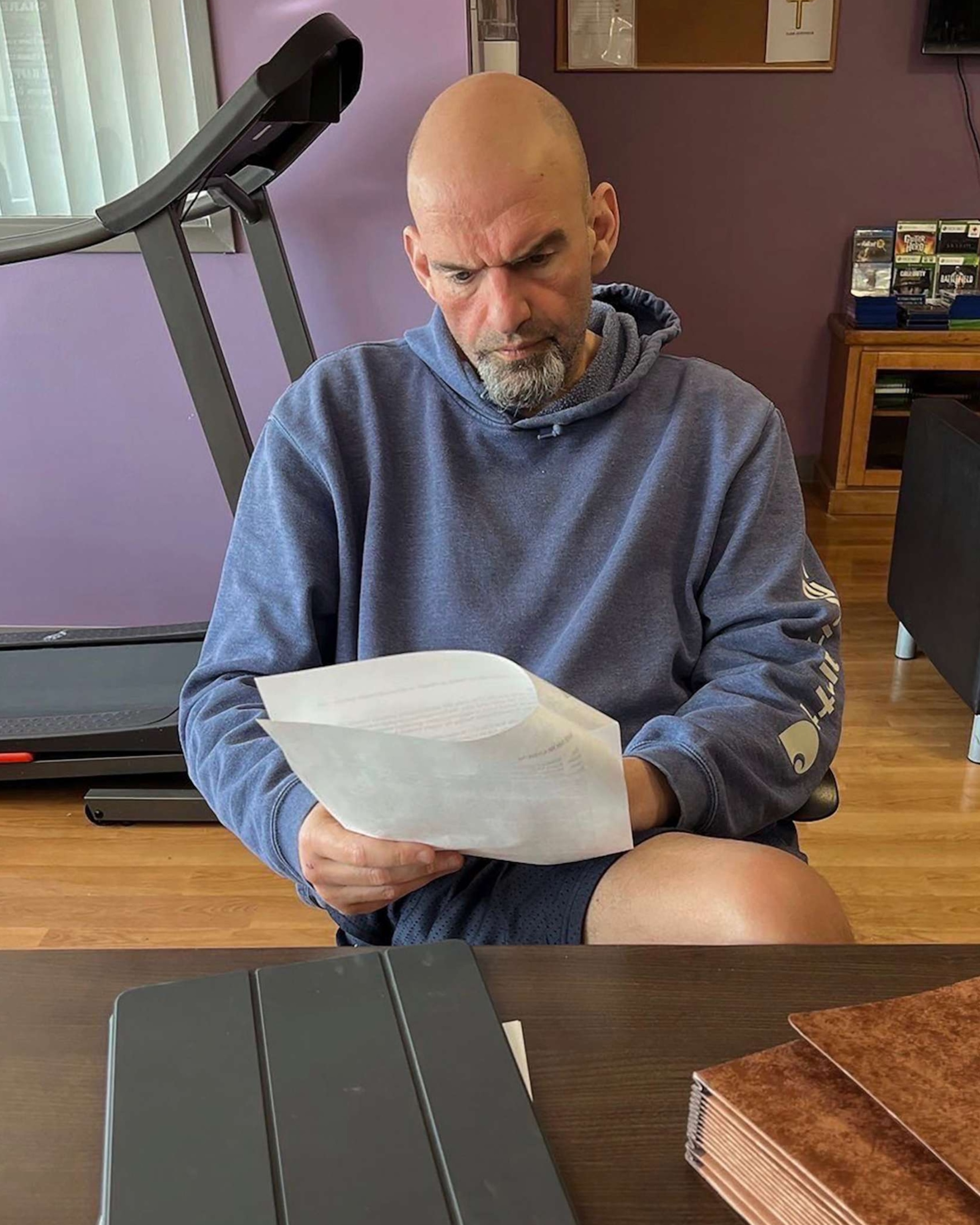 PHOTO: Sen. John Fetterman reviewing documents on rail safety legislation and the Farm Bill while at the Walter Reed National Military Medical Center in Washington, Mar.6, 2023 in a photo posted by his Chief of Staff to Twitter.