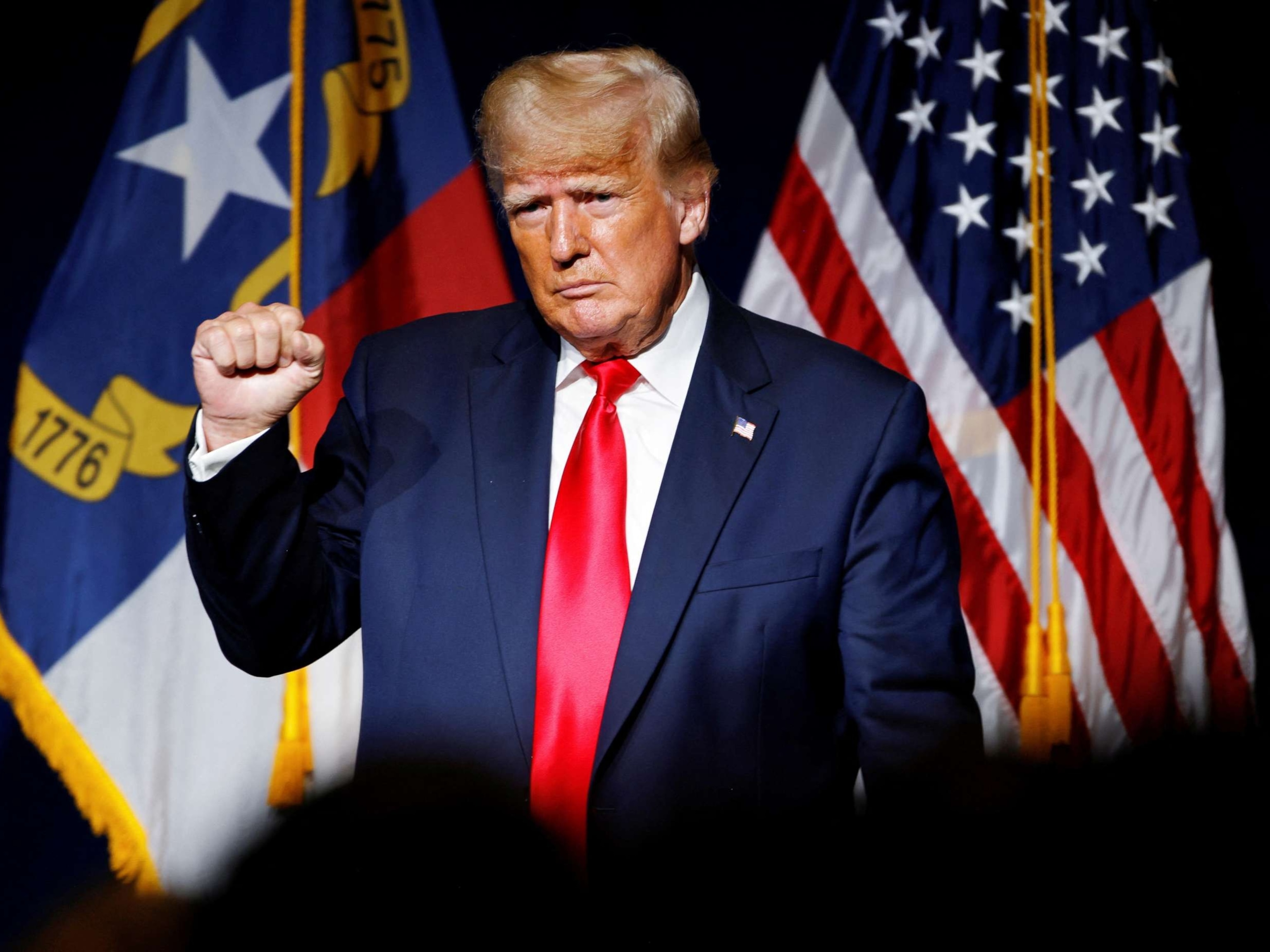 PHOTO: Former President Donald Trump reacts to applause after speaking at the North Carolina GOP convention dinner in Greenville, North Carolina, June 5, 2021.