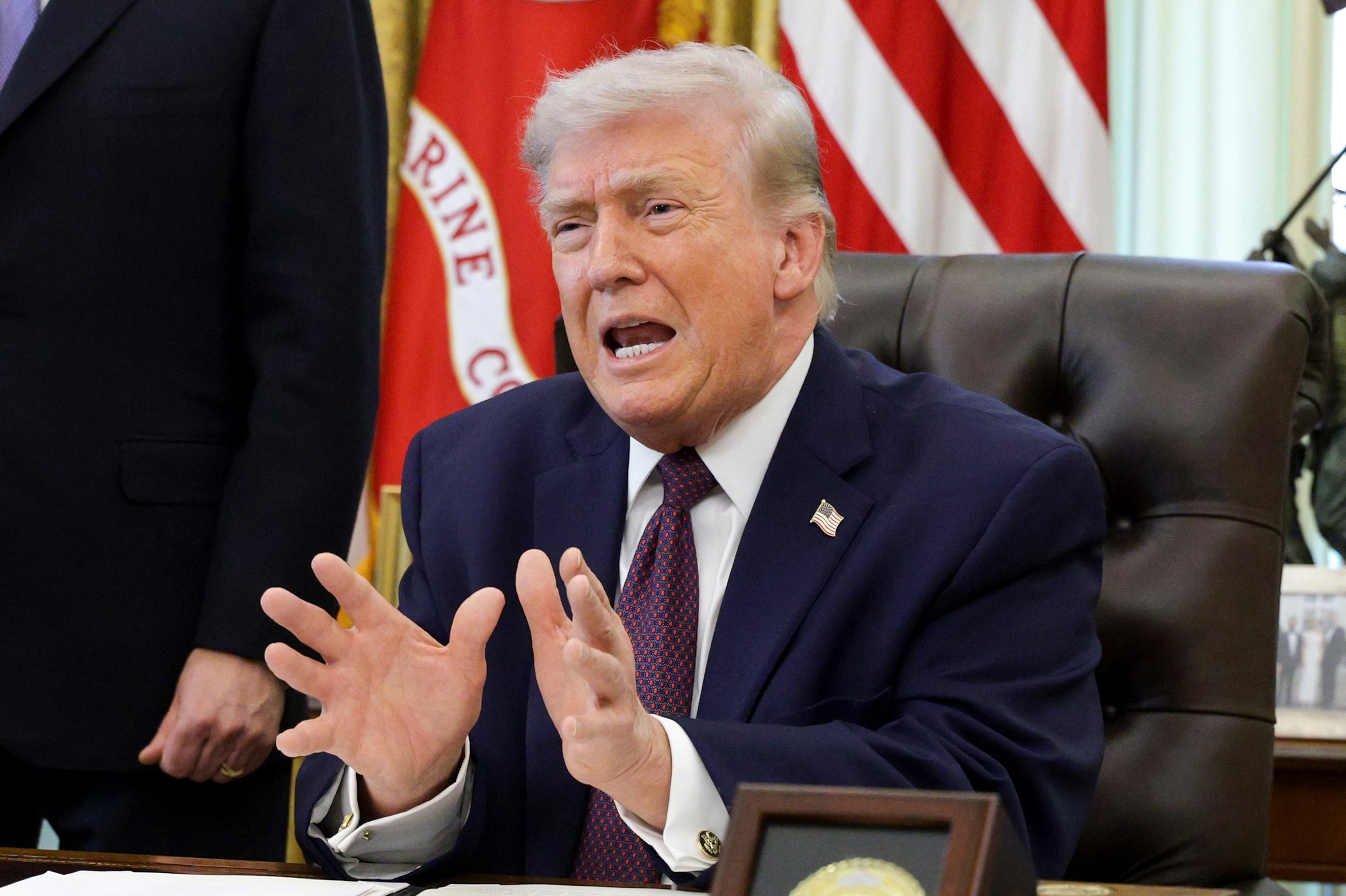 PHOTO: President Donald Trump  speaks before signing an executive order to limit mail-in voting in the Oval Office of the White House on March 31, 2026, in Washington, D.C.