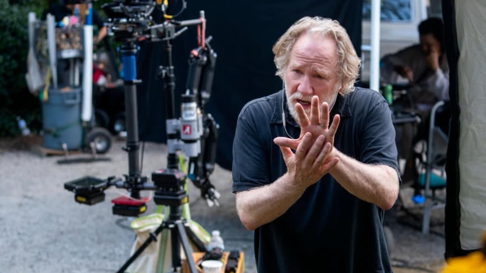 Actor Timothy Busfield, who faces child sex abuse charges, surrenders to  police