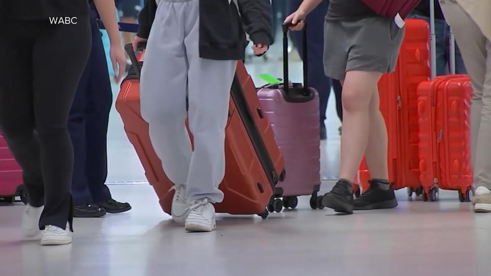 Video Flash flood threats amid record travel rush