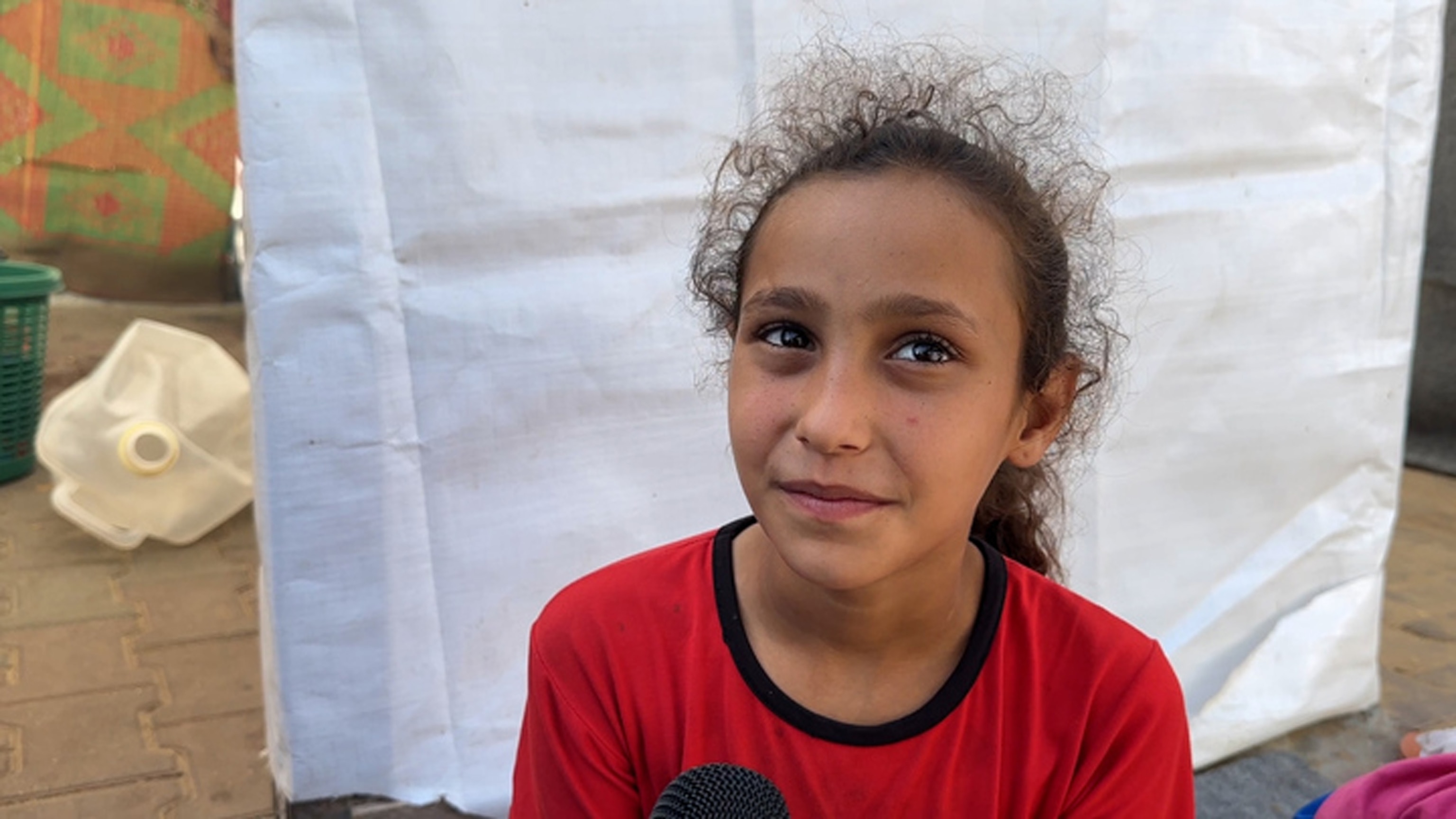 PHOTO: Hanin, a 10-year-old Palestinian girl, staying at the the U.N. Relief and Works Agency shelter in Khan Yunis in southern Gaza. 