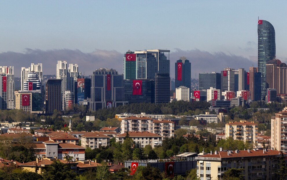 PHOTO: Turkey's national flags are displayed on buildings a head of the National Sovereignty and Child's Day in the financial district of Istanbul