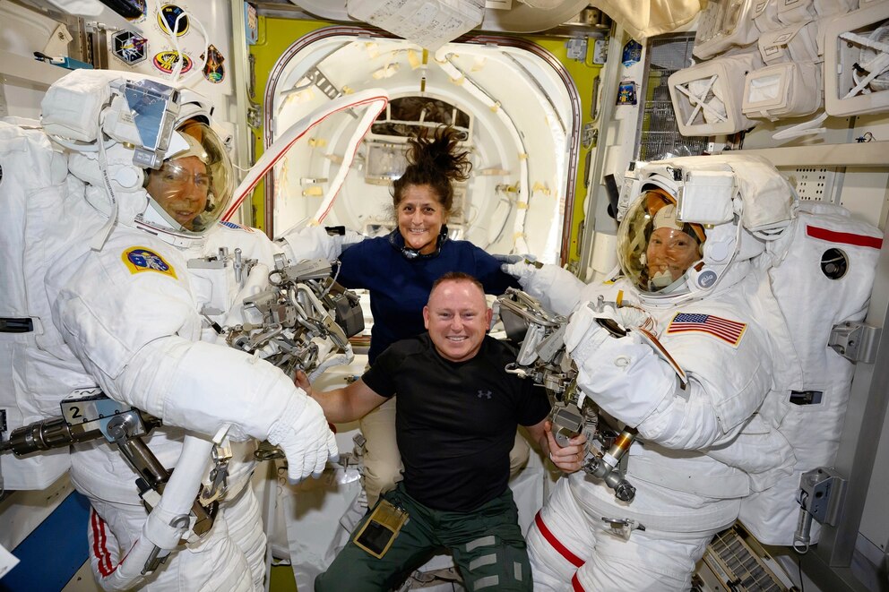 PHOTO: In this June 24, 2024 file photo provided by NASA, Boeing Crew Flight Test astronauts Suni Williams and Butch Wilmore, center, pose with Expedition 71 Flight Engineers aboard the International Space Station's Quest airlock.