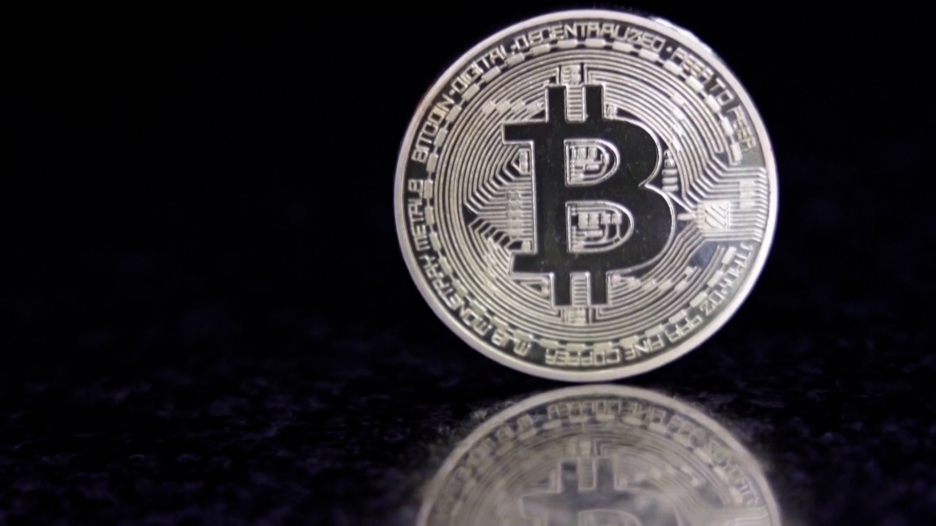 Bitcoin soars to record high following UK approval of crypto asset - ABC  News