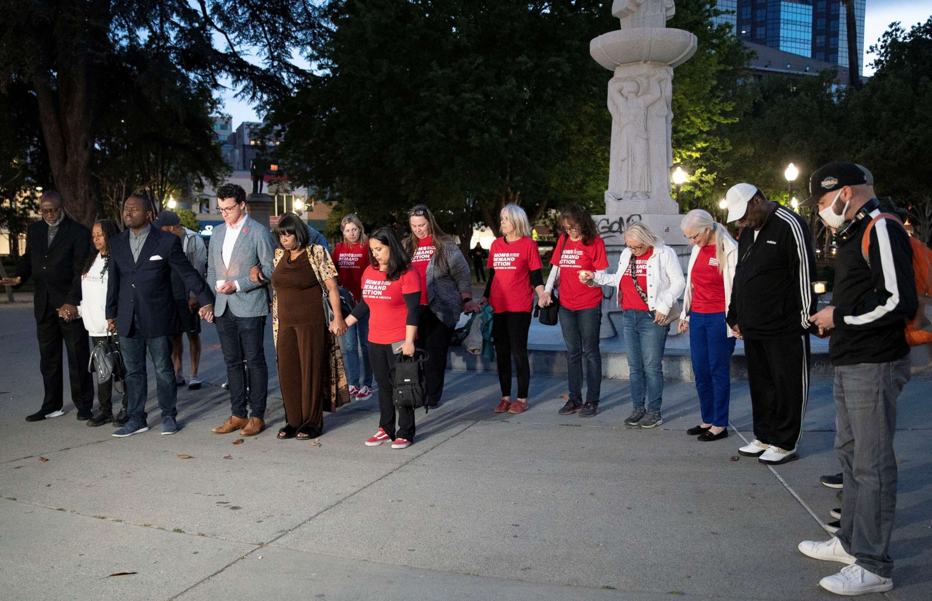 PHOTO: People mourn for victims of a mass shooting at a park in Sacramento, April 3, 2022. 