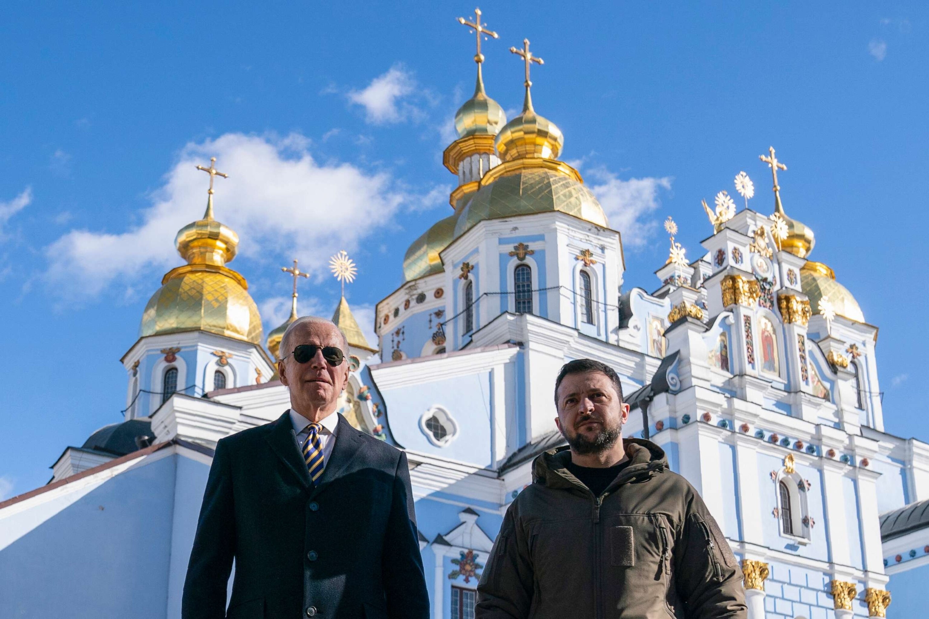 PHOTO: President Joe Biden walks with Ukrainian President Volodymyr Zelenskyy at St. Michael's Golden-Domed Cathedral on a surprise visit, Feb. 20, 2023, in Kyiv.