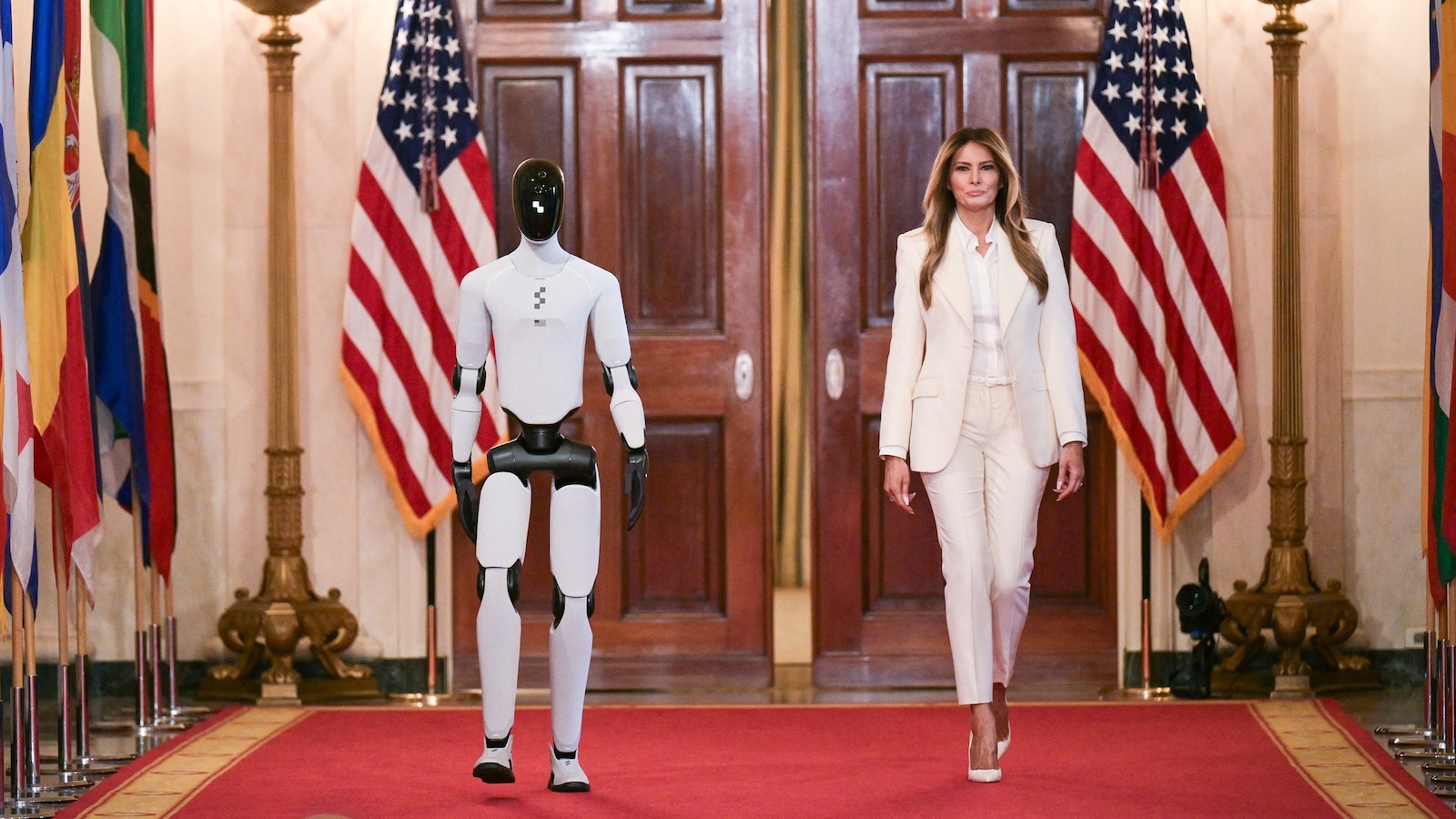 First lady Melania Trump enters White House summit with walking, talking humanoid robot