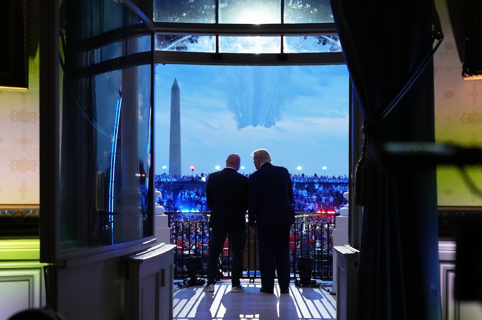 PHOTO: President Donald Trump and UFC President and CEO Dana White watch the U.S. Air Force Thunderbirds and U.S. Navy Blue Angels perform a fly over during the UFC Freedom 250 fights on the South Lawn of the White House, June 14, 2026, in Washington.