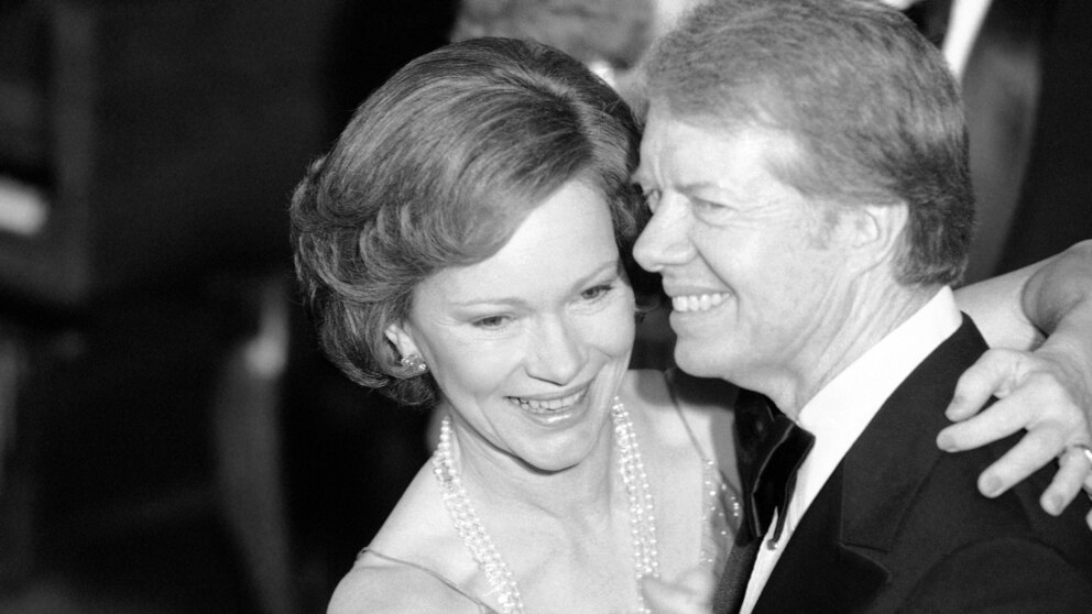 FILE - President Jimmy Carter, right, and his wife, first lady Rosalynn Carter, lead their guests in dancing at the annual Congressional Christmas Ball, Dec. 13, 1978, at the White House in Washington. Rosalynn Carter, the closest adviser to Jimmy Carter during his one term as U.S. president and their four decades thereafter as global humanitarians, died Sunday, Nov. 19, 2023. She was 96. (AP Photo/Ira Schwarz, File)