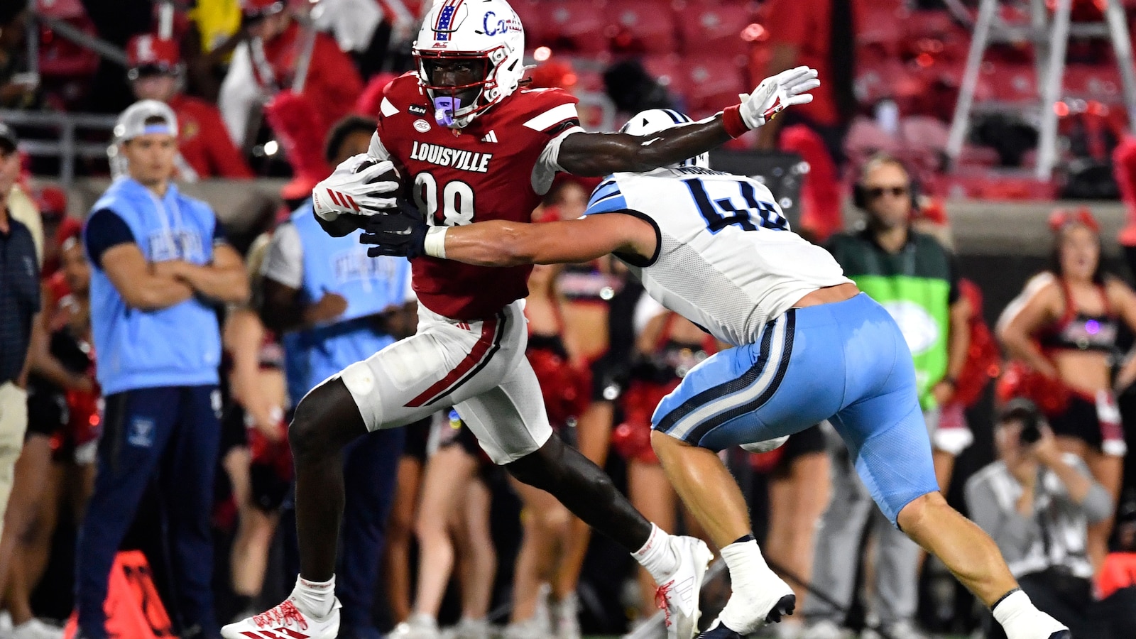 Kienholz leads as No. 24 Louisville routs Villanova 59-13 for first victory