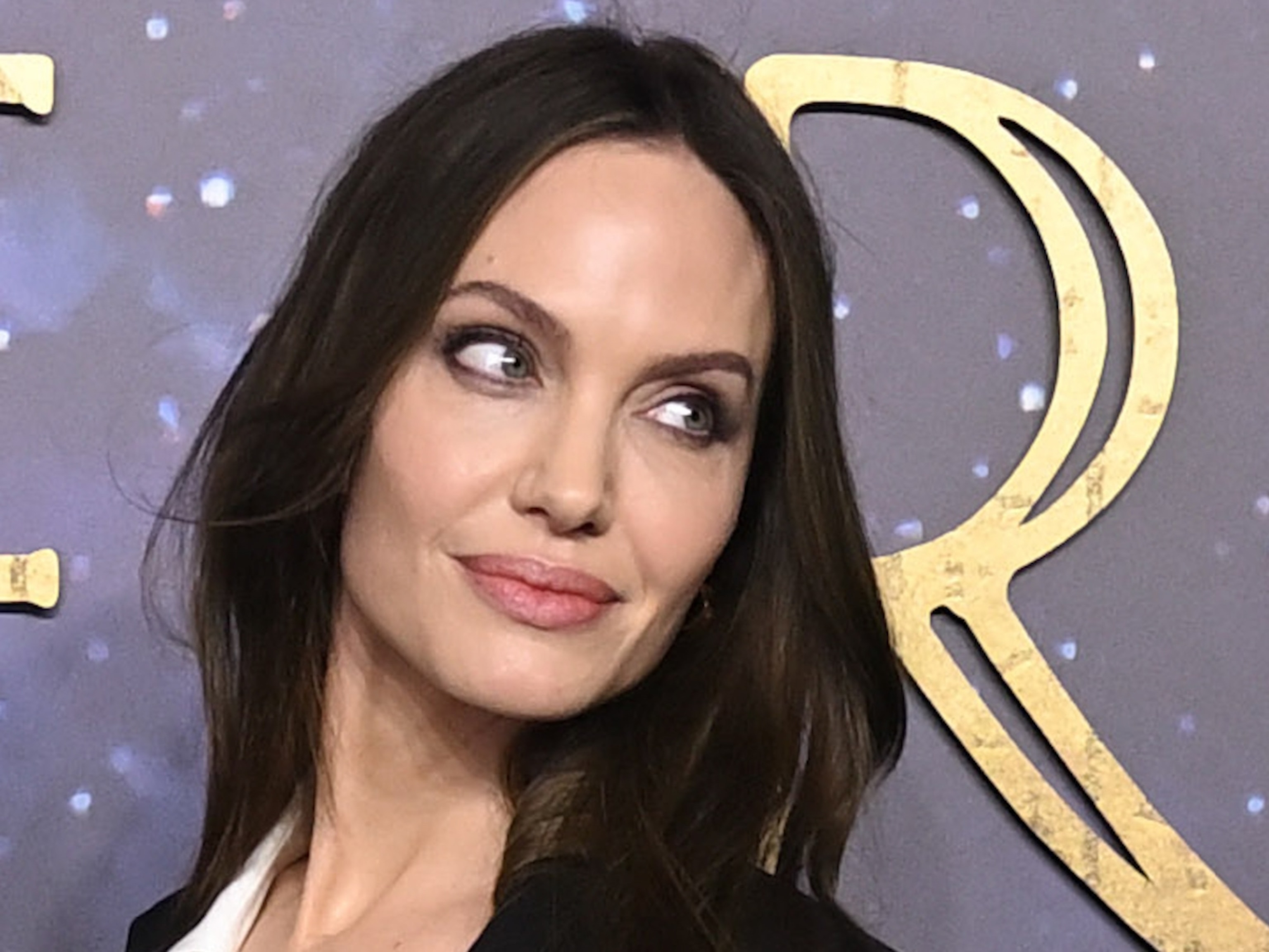Angelina Jolie & Vivienne Share Matching Tattoo