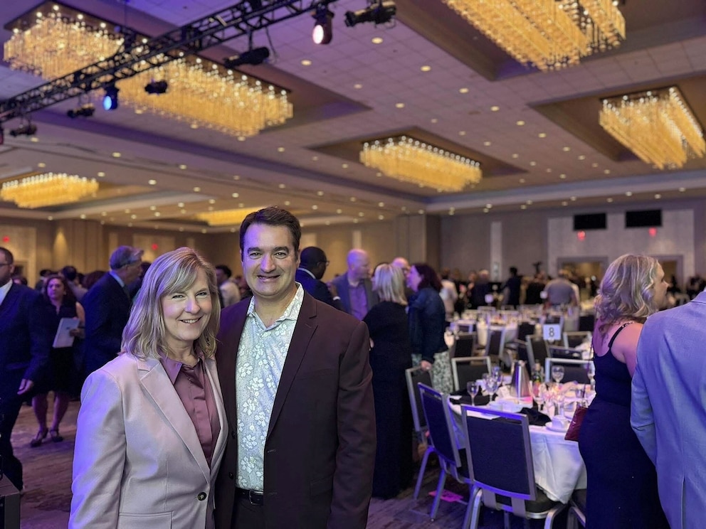 PHOTO: Melissa Hortman, a former assembly speaker and her husband, Mark, pose for a photograph at the annual Humphrey-Mondale Dinner in Minneapolis