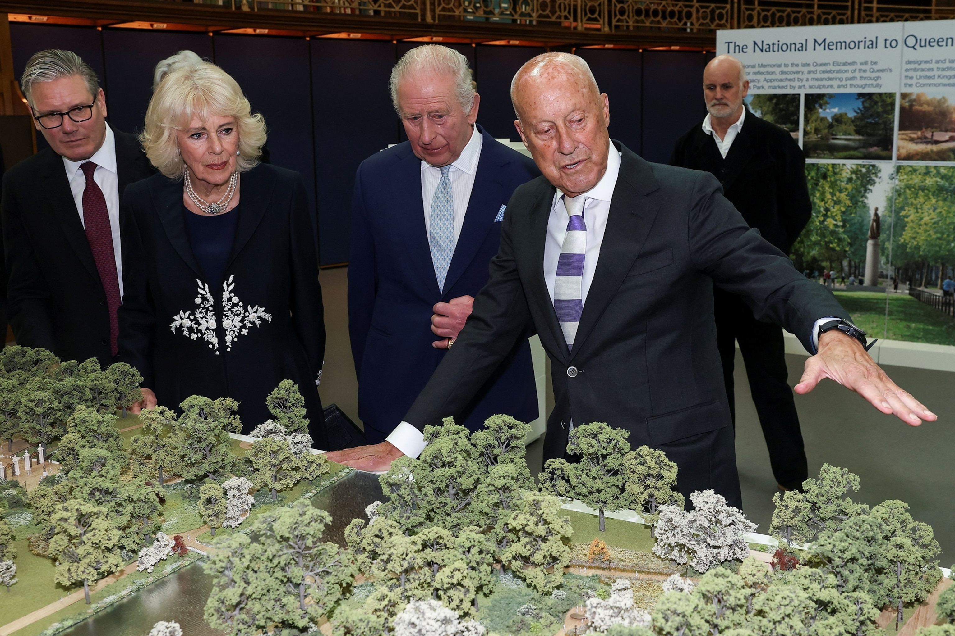 PHOTO: Britain's King Charles and Queen Camilla, with architect Norman Foster and British Prime Minister Keir Starmer, attend a presentation on the final design for the national memorial to Queen Elizabeth II in London, April 21, 2026. 