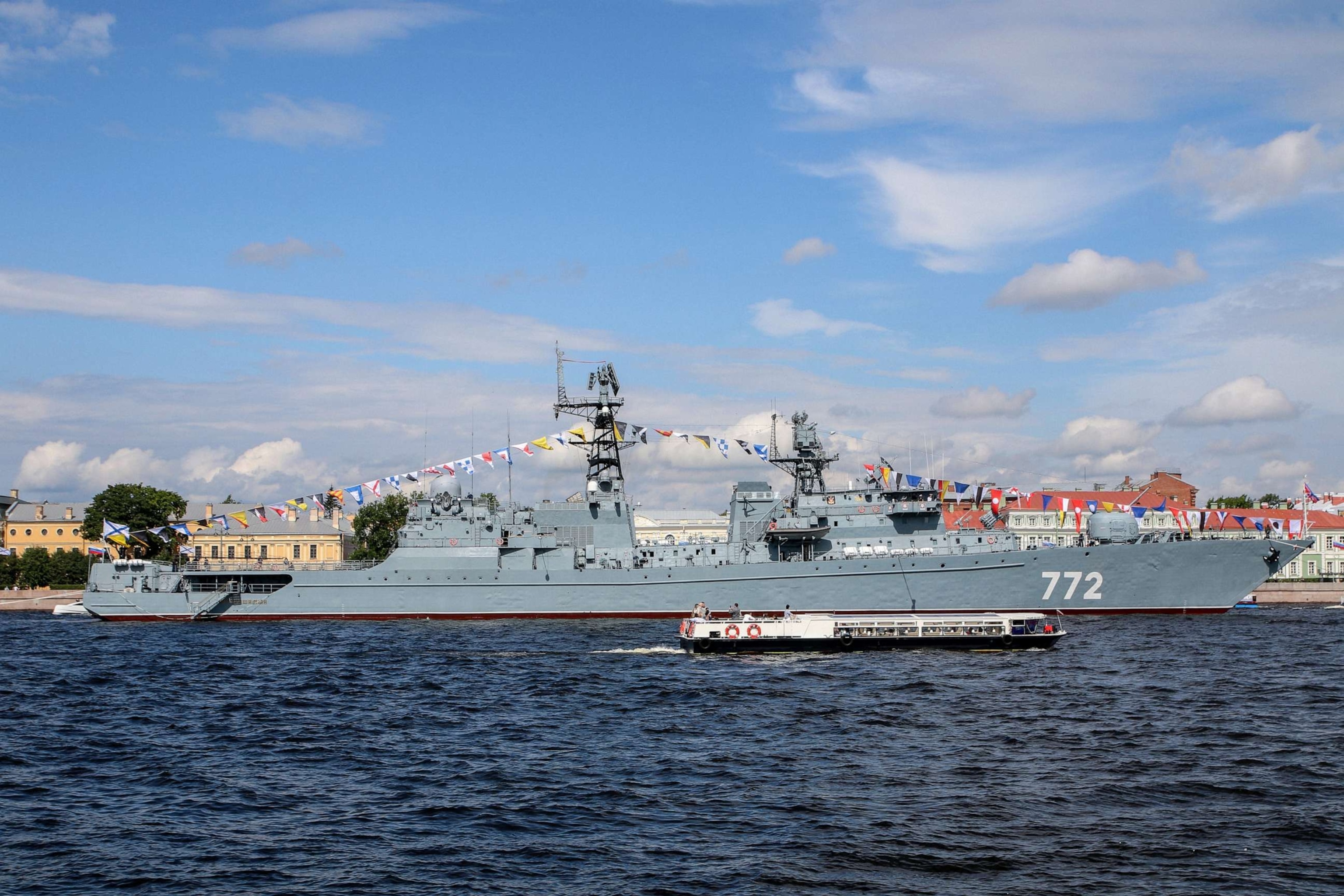 PHOTO: A military warship of the Armed Forces of the Russian Federation arrives in Saint Petersburg and moored on the Neva River to participate in the Main Naval Parade of the Russian Navy, July 29, 2023.