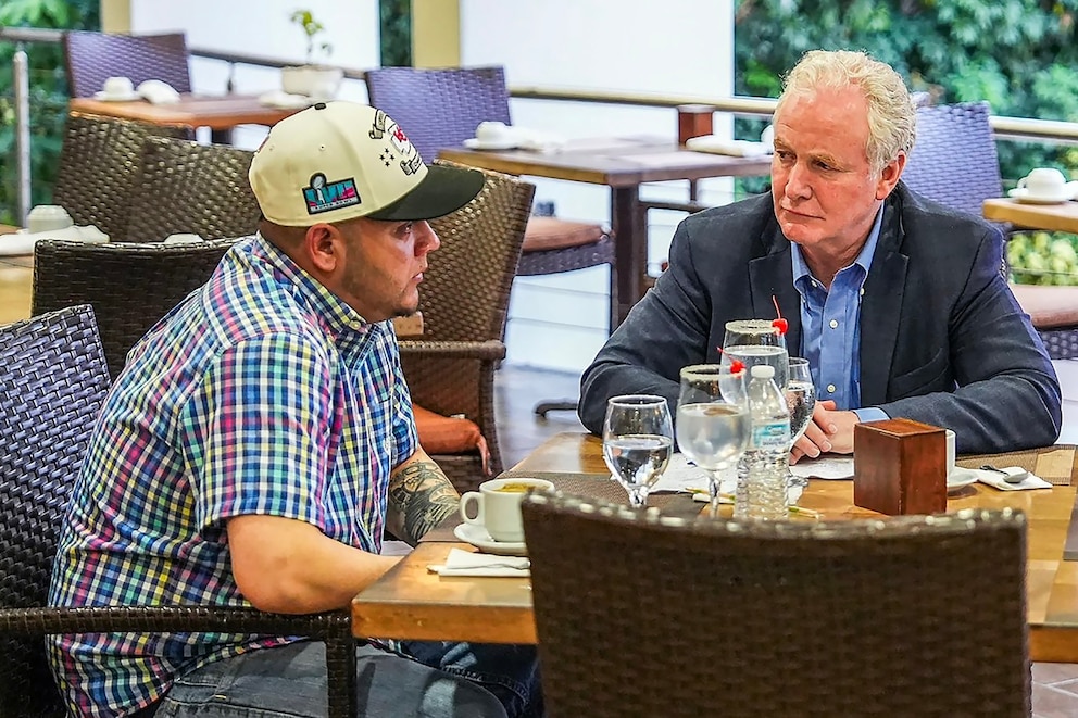 PHOTO: Senator Chris Van Hollen holds a meeting with Salvadoran migrant Kilmar Abrego Garcia (L), a US citizen wrongfully deported to his home country, at a hotel in San Salvador on April 17, 2025.
