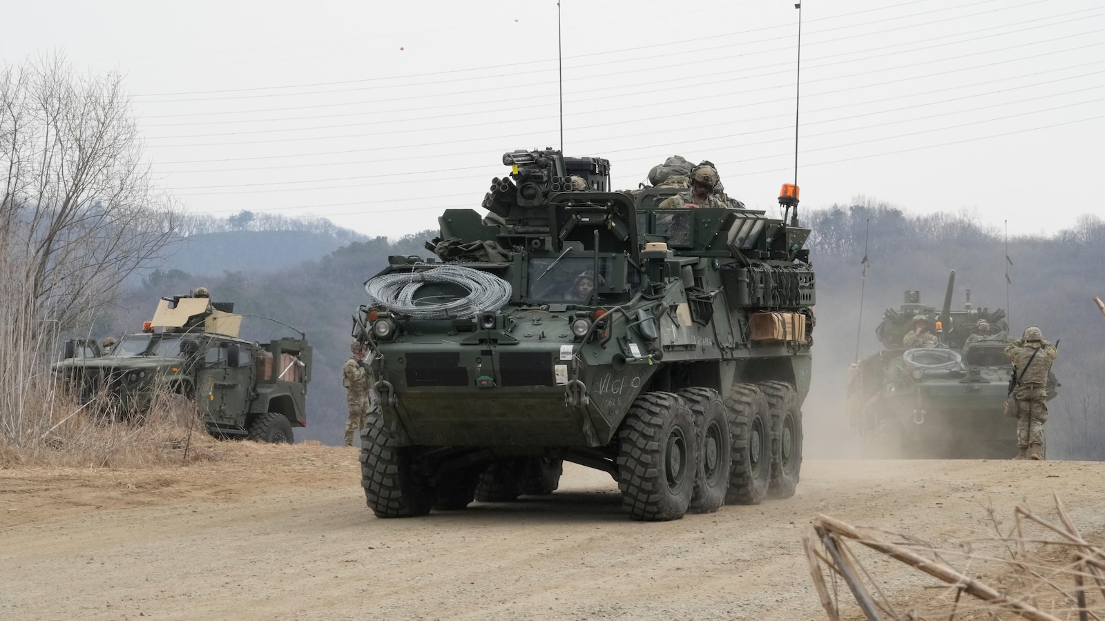 North Korea fires about 10 missiles toward sea in show of force, Seoul says