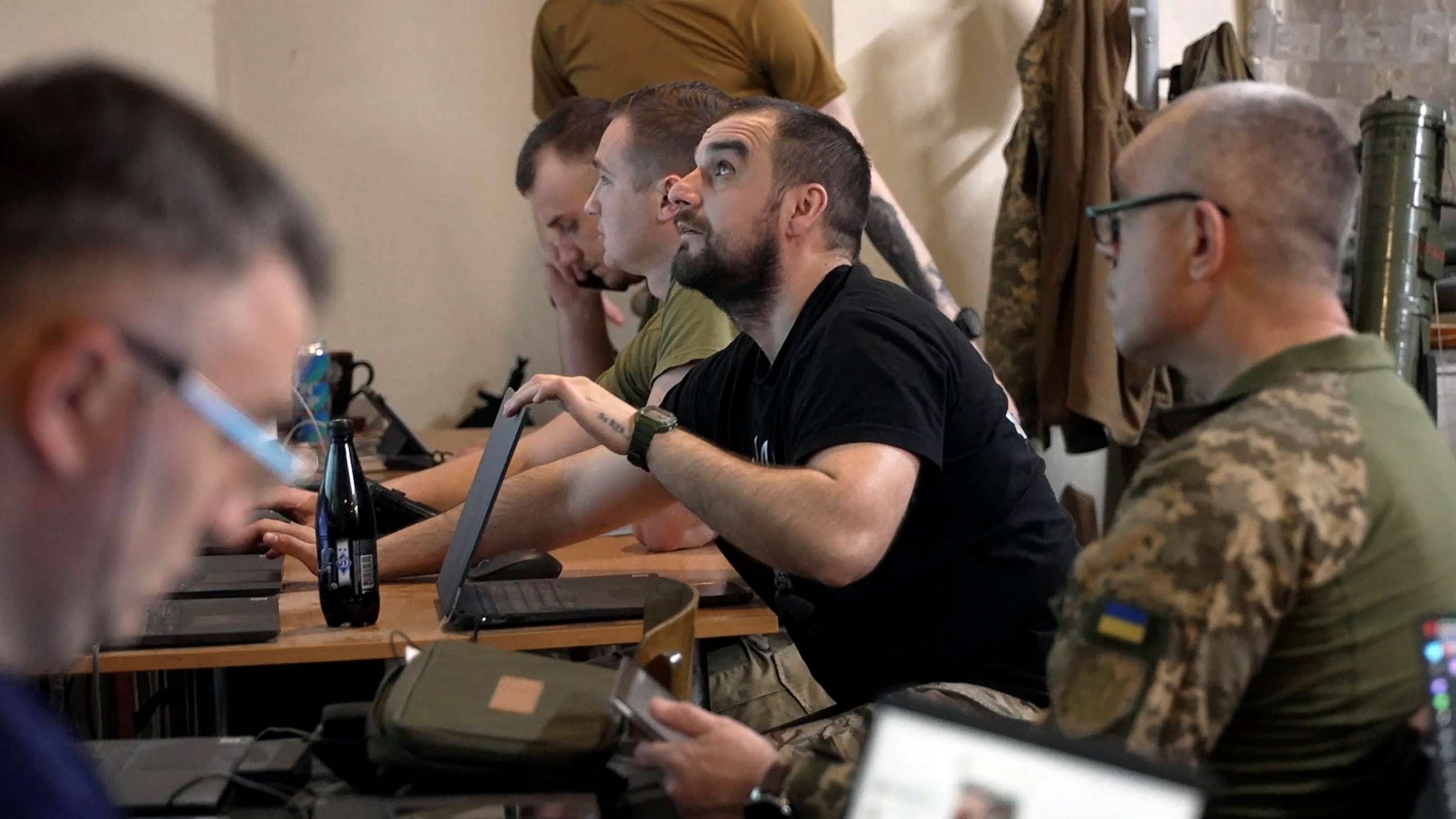 PHOTO: Ukrainian military officials monitor the battlefield via drones from inside a military command center at an undisclosed location in eastern Ukraine, near the frontline.