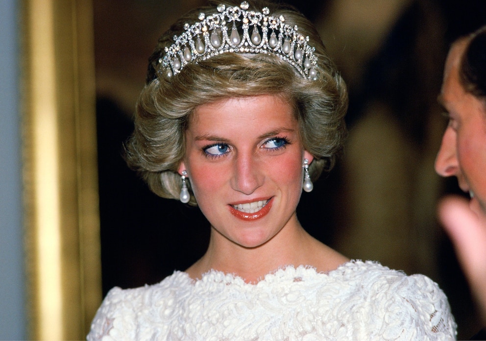 Diana, Princess Of Wales, Talking To Her Husband, During A Visit To The British Embassy.