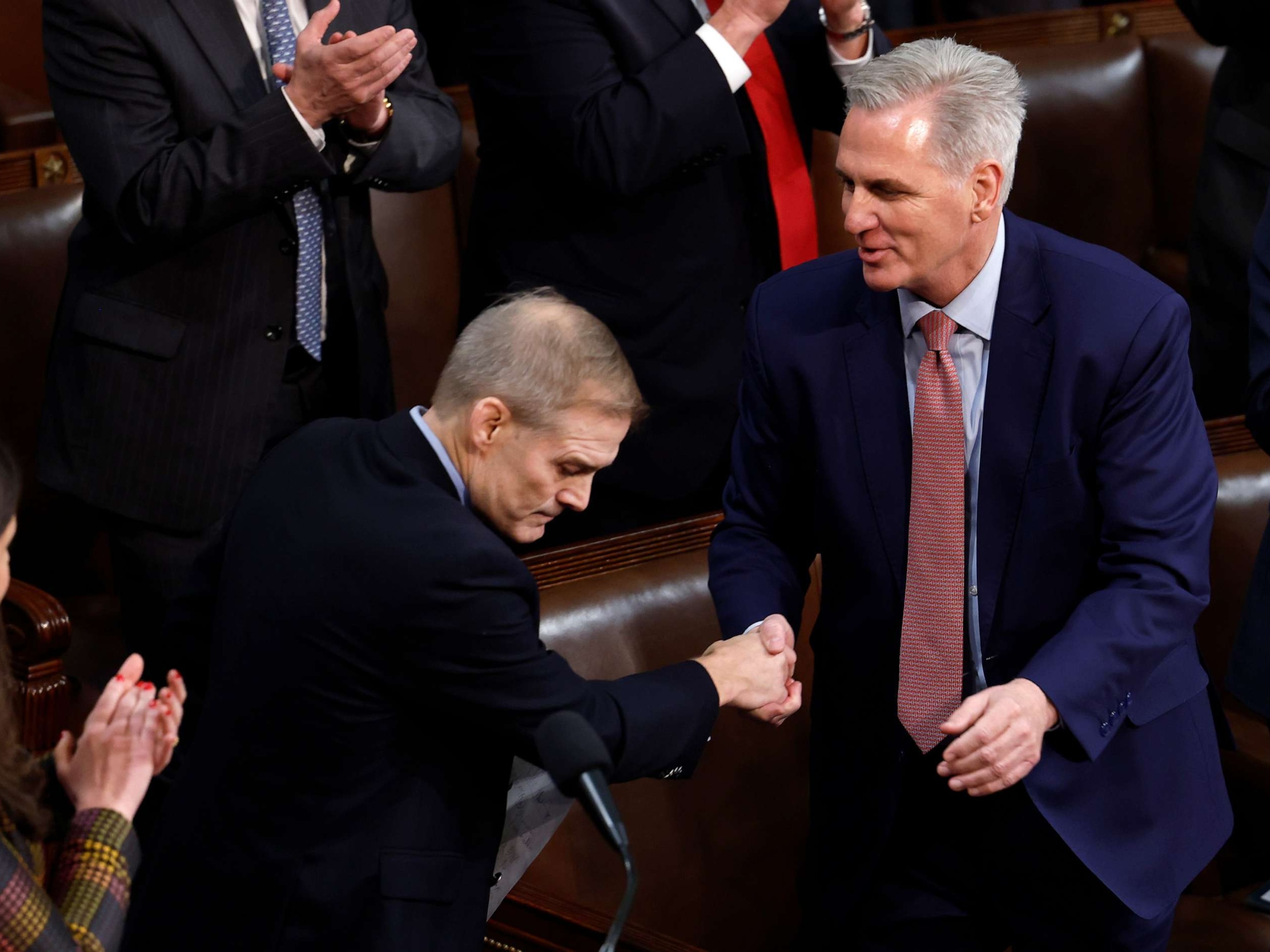 PHOTO: House Minority Leader Kevin McCarthy (R-CA) (R) shakes hands with Rep. Jim Jordan (R-OH) as Representatives cast their votes for Speaker of the House on the first day of the 118th Congress in the Capitol Building on Jan. 03, 2023 in Washington, DC.