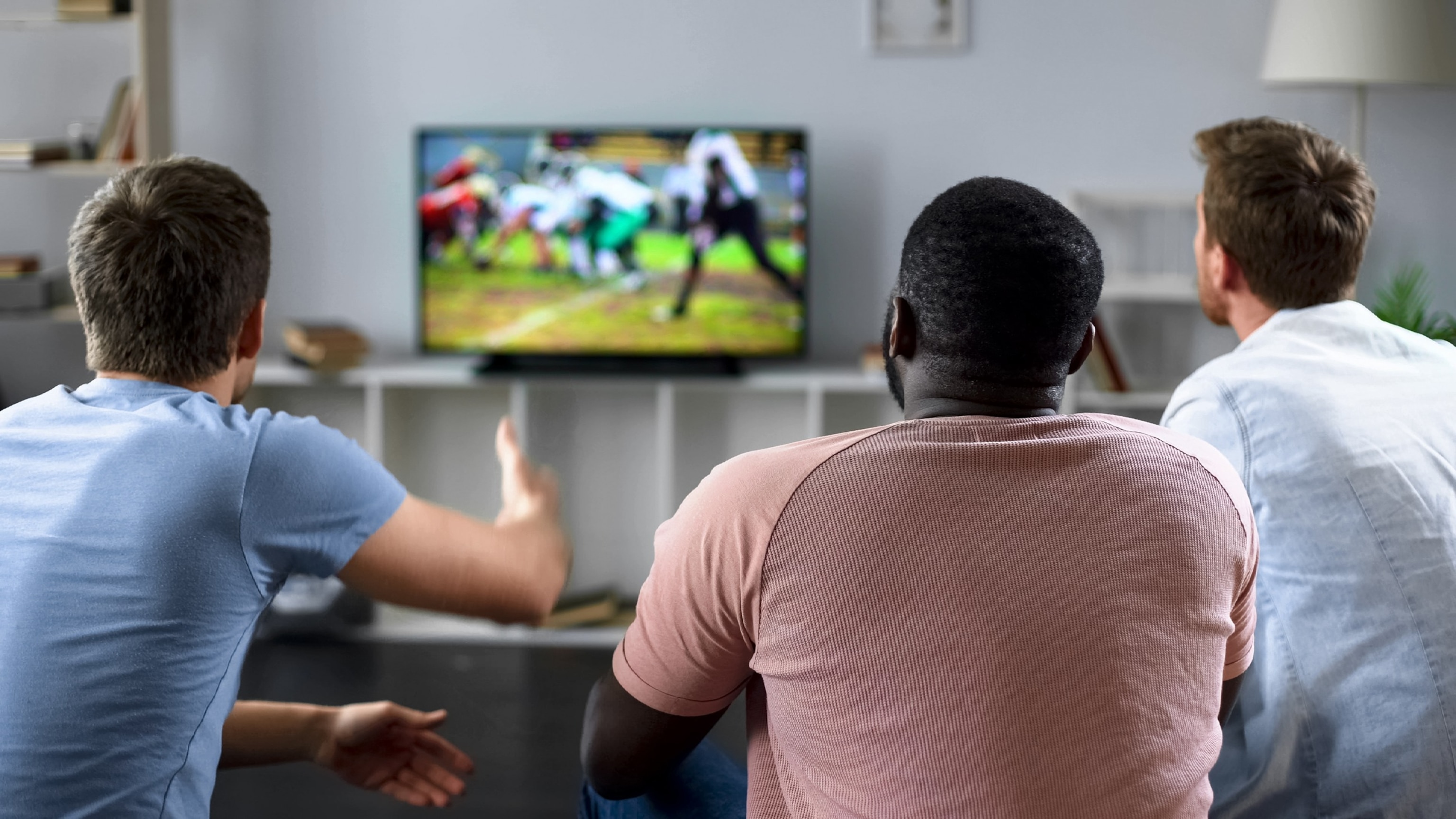 PHOTO: People watch a football game in an undated stock photo.