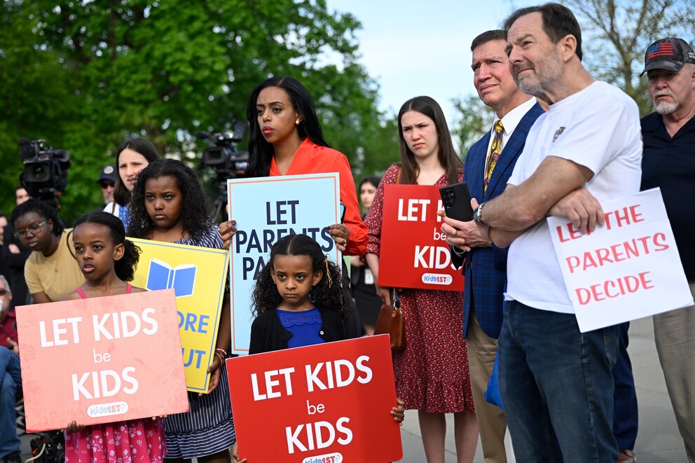 PHOTO: In this April 22, 2025, file photo, members supporting the Opt Out policy in public schools attend a rally in Washington, D.C., as oral arguments are heard on Mahmoud v. Taylor, a religious freedom case involving LBGTQ+ curriculum. 