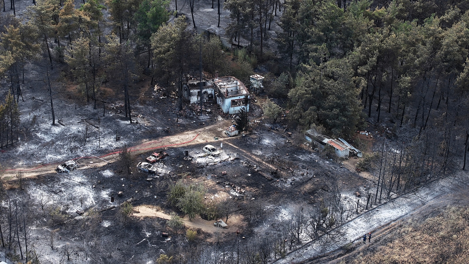 Wildfires kill a father and son in Greece and prompt evacuations in 2 villages