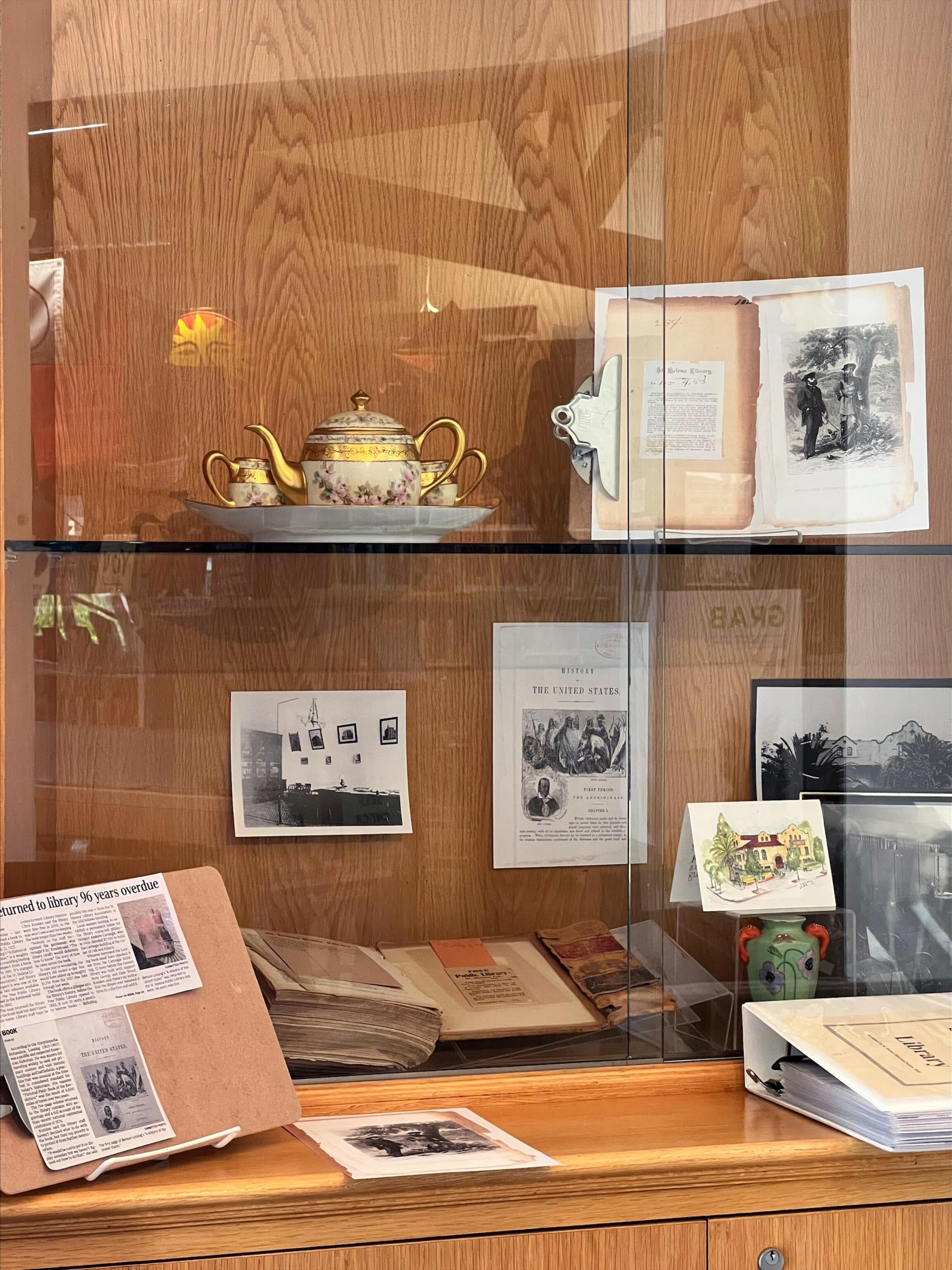 PHOTO: “A History of the United States” by Benson Lossing, sits in a display case at the St. Helena Public Library.