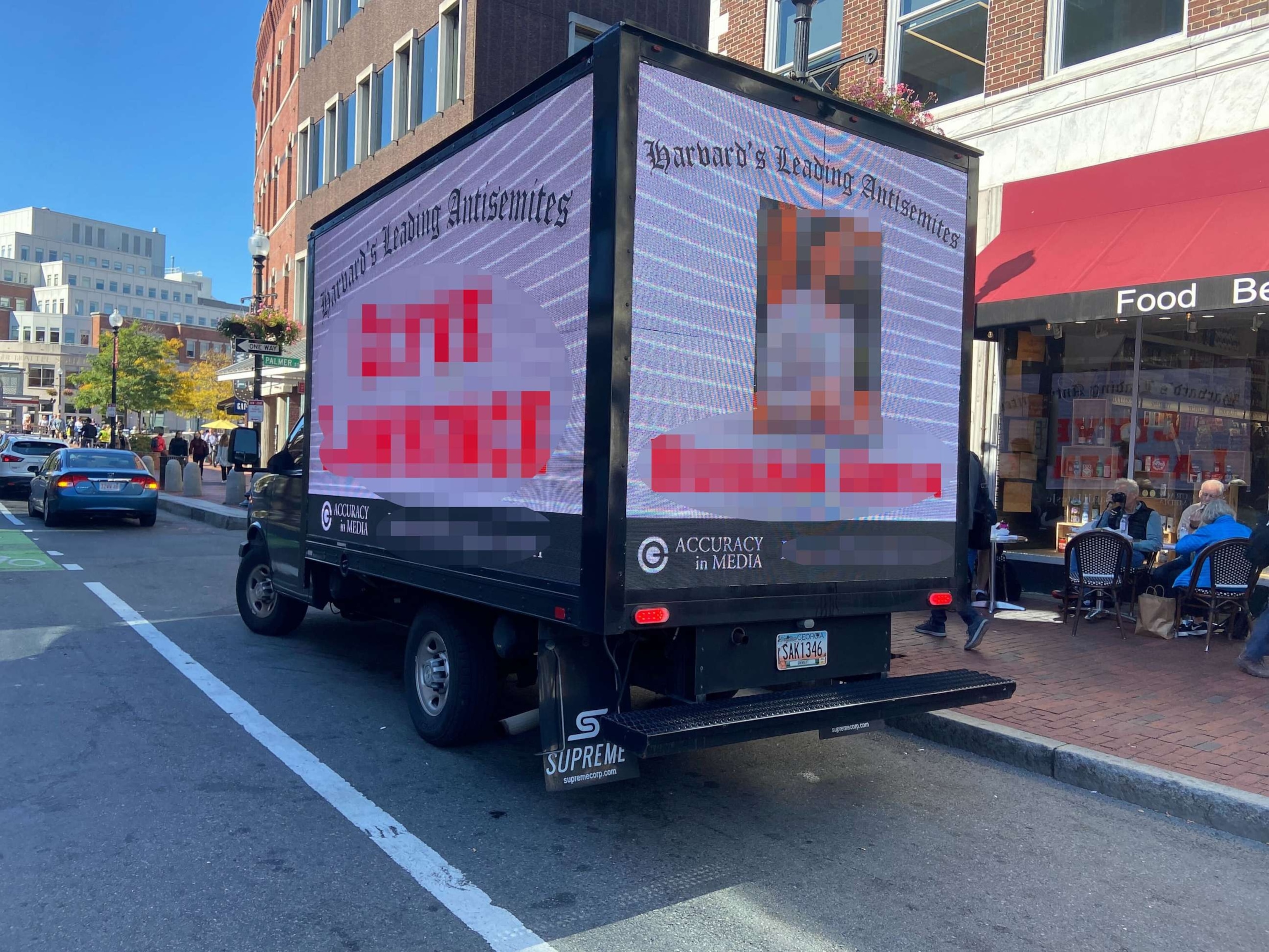 PHOTO: A truck driving around Harvard's campus identifies people who signed onto a controversial letter supporting Palestinians in the wake of an attack by Hamas.