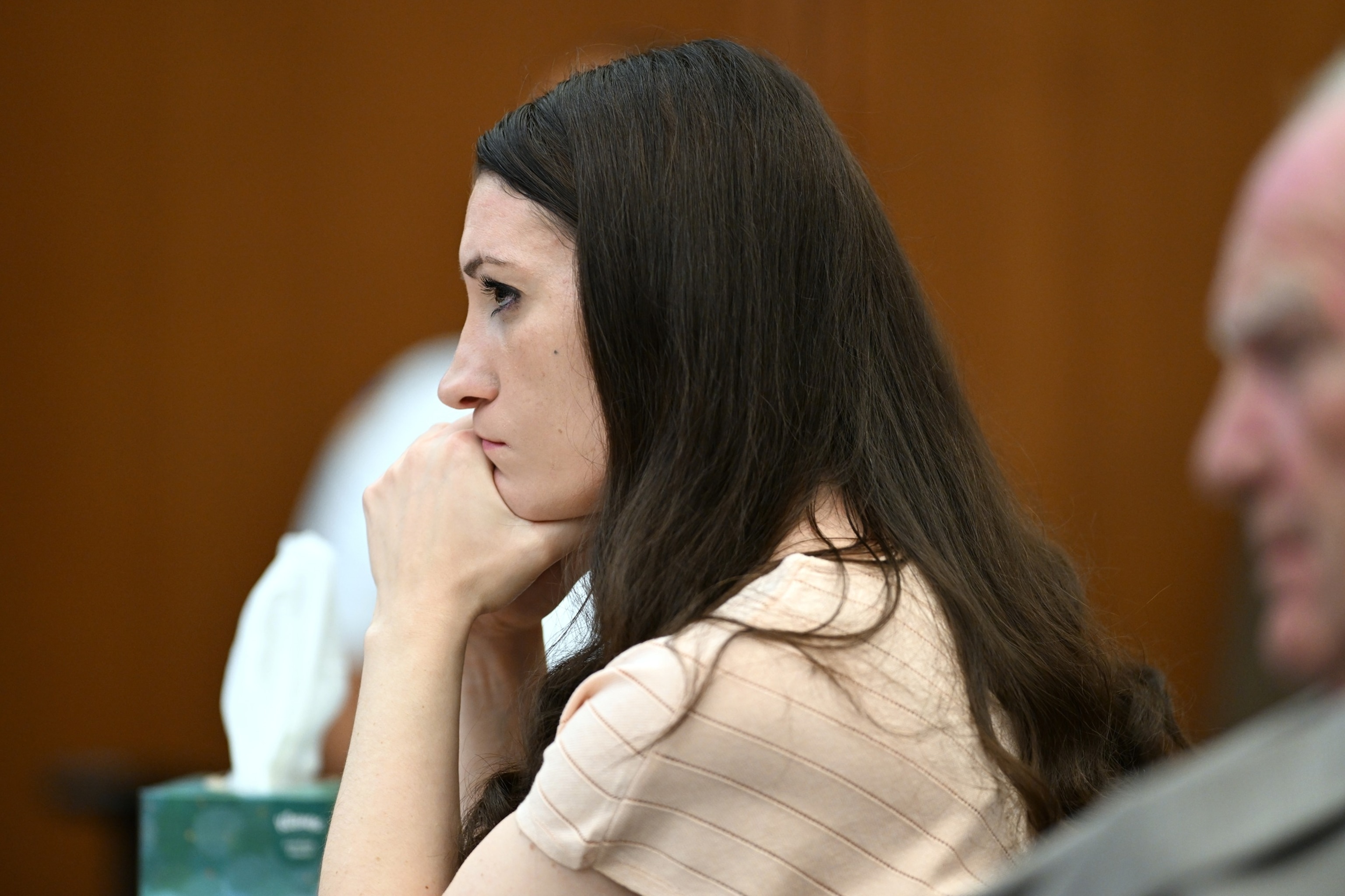 PHOTO: Lindsay Clancy, center, and her lawyer Kevin Reddington, right, listen during testimony during Clancy's murder trial, Aug. 13, 2026., in Plymouth, Mass.