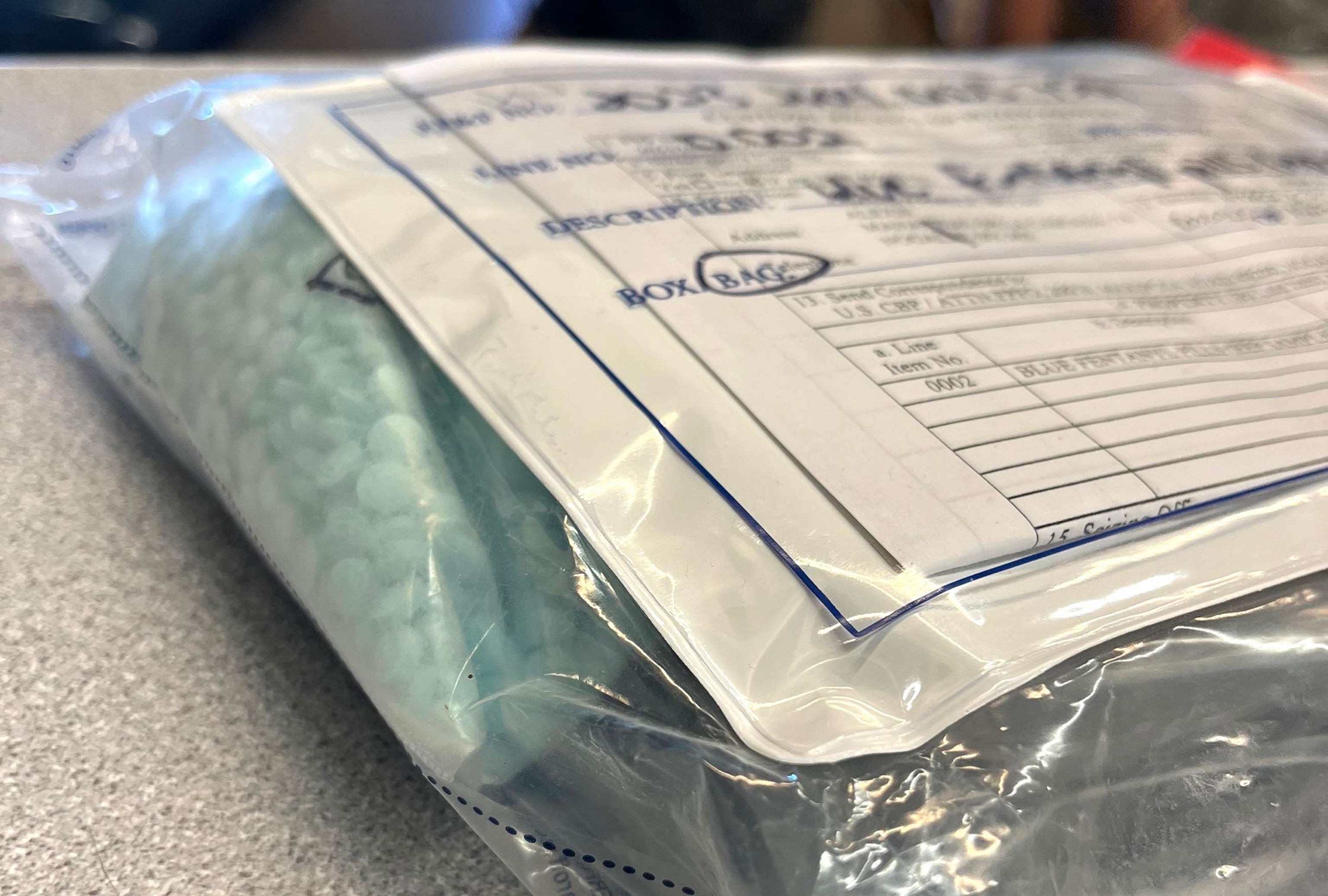 PHOTO: U.S. Customs and Border Protection seized more than 1.5 pounds of blue fentanyl pills found tapped around a suspect's stomach.