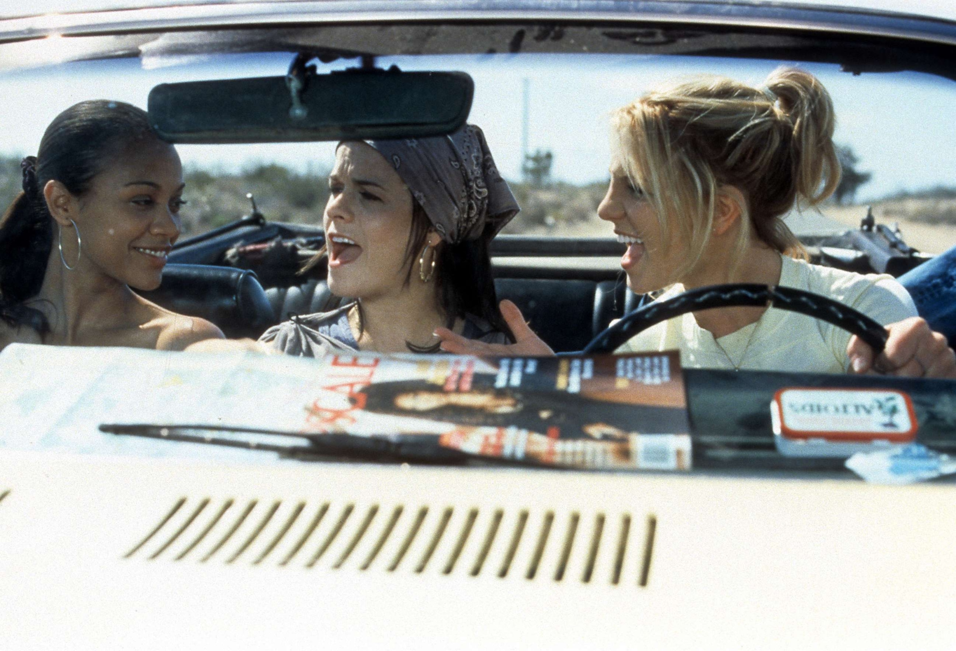 PHOTO: Zoe Saldana, Taryn Manning, and Britney Spears riding in car in a scene from the film "Crossroads," 2002.