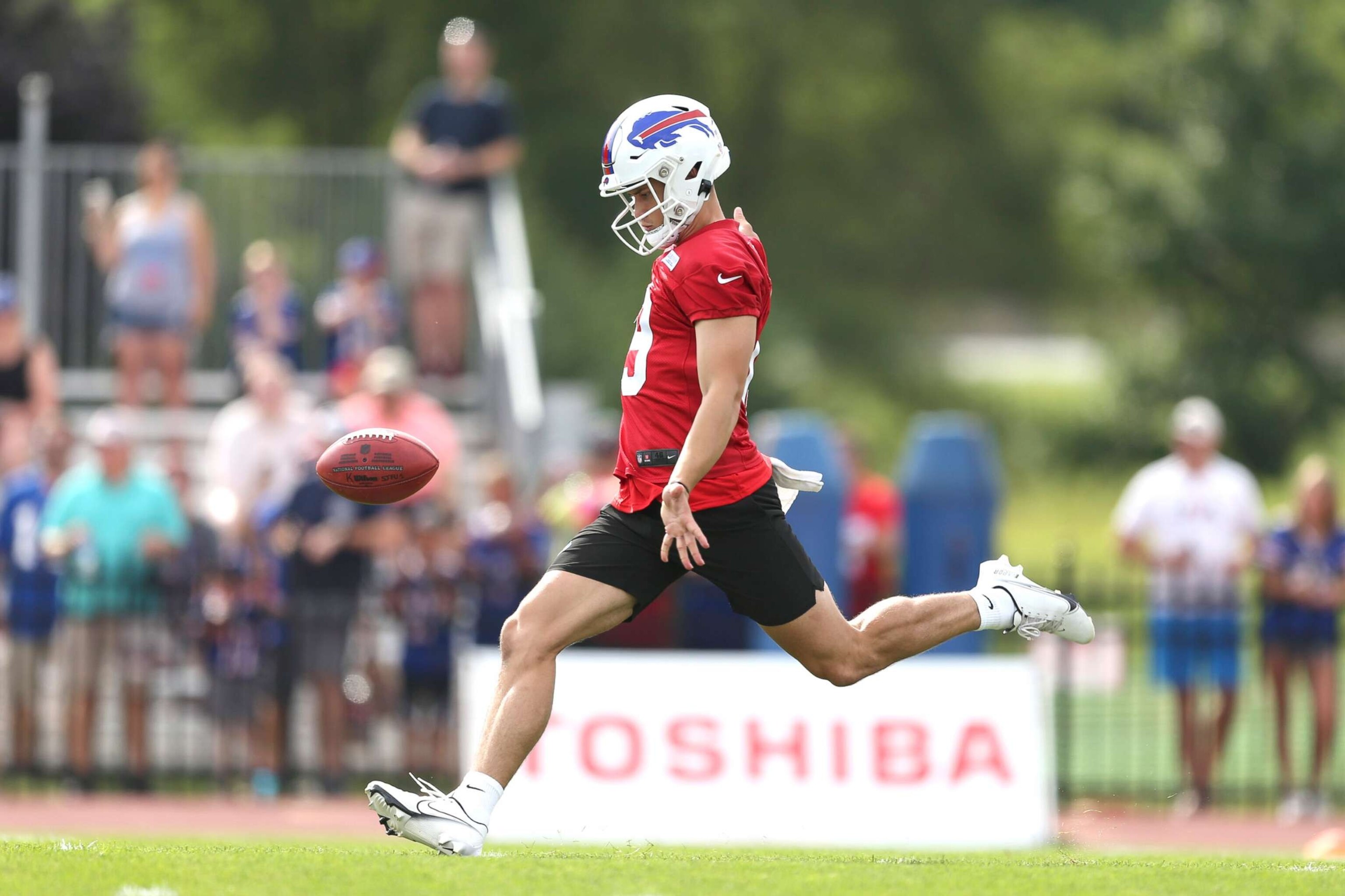 PHOTO: Matt Araiza #19 of the Buffalo Bills punts during Bills training camp at Saint John Fisher University on July 24, 2022 in Pittsford, N.Y.